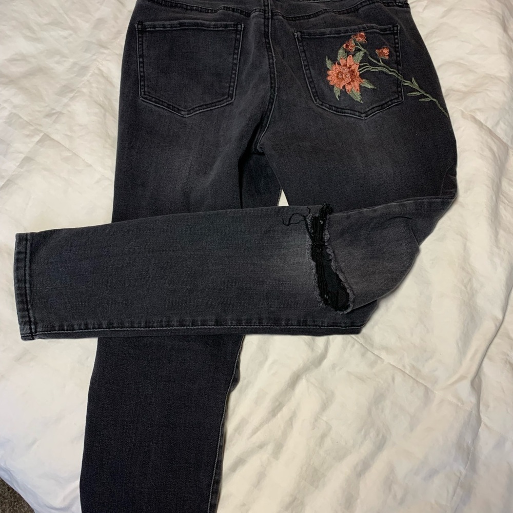 Mid rise black refuge skinny jeans with floral embroidery